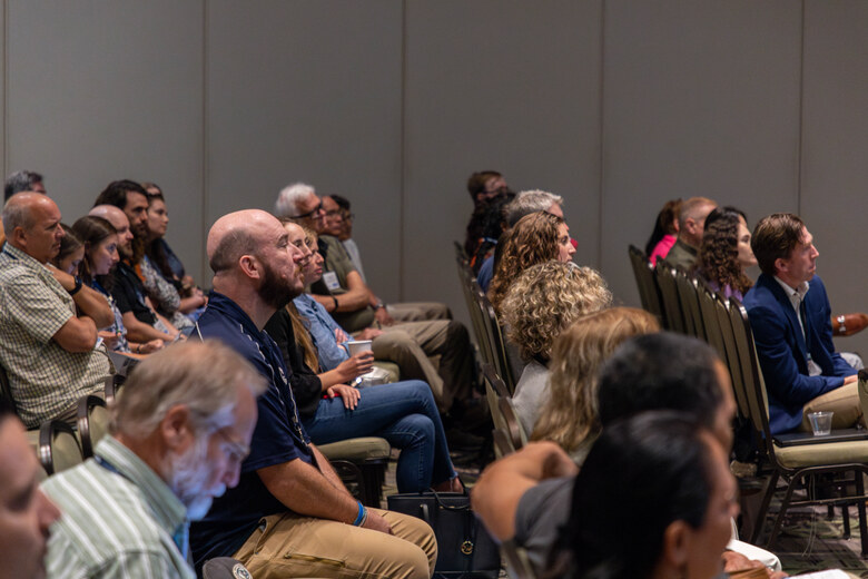 Delegates listening during a session at ICSR 2024